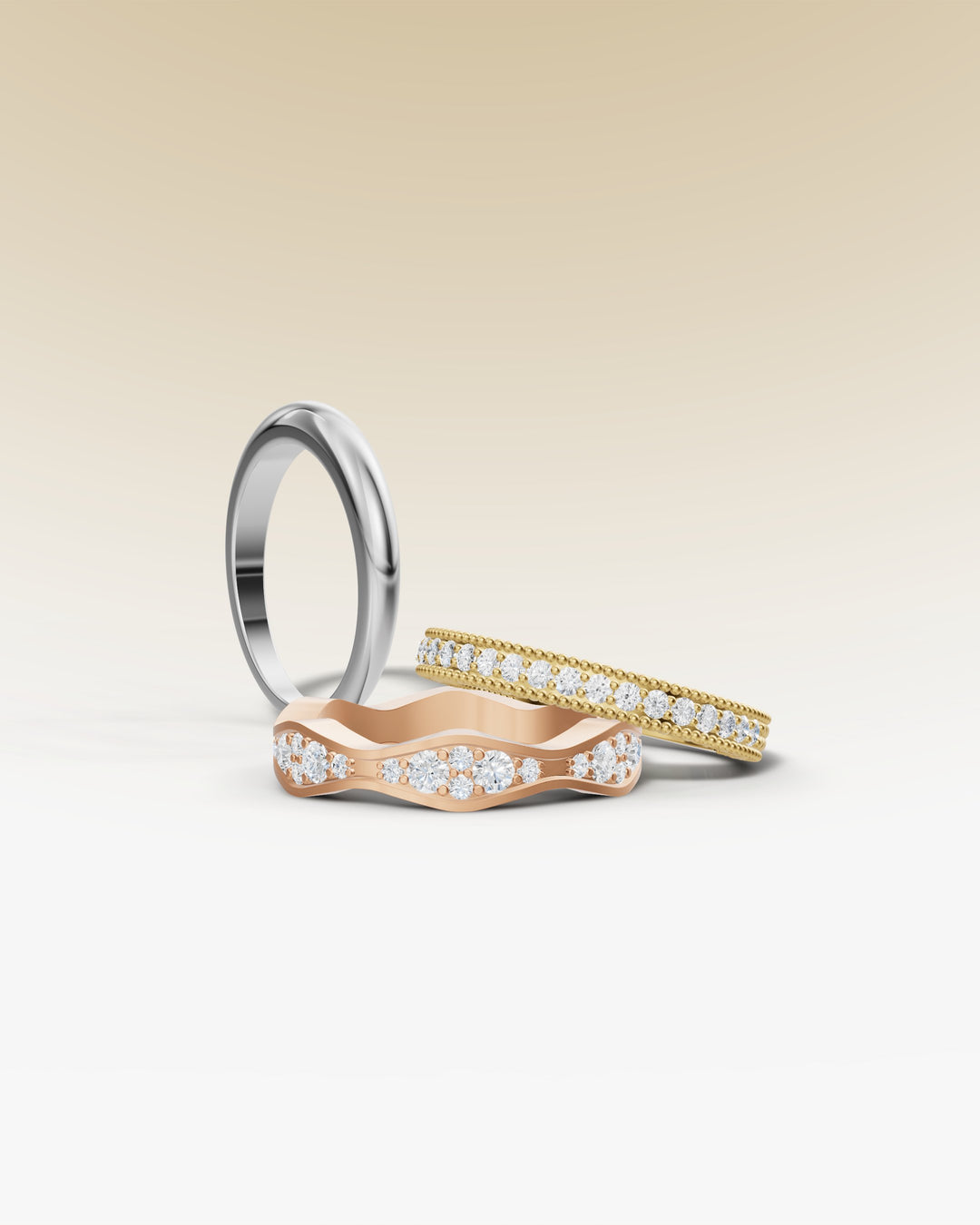 Women's bands collection with white gold, rose gold, yellow gold, and diamonds