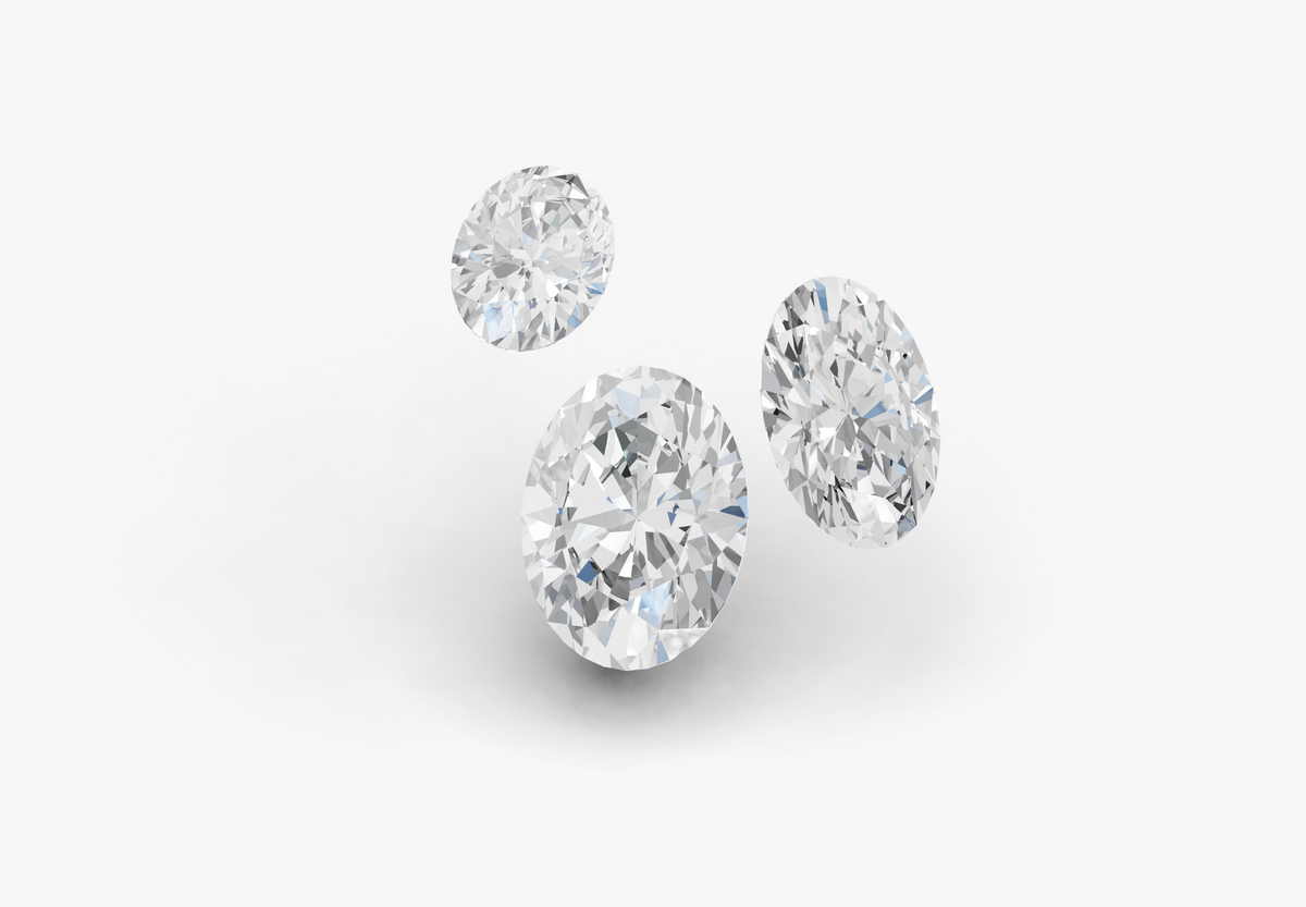 Three oval diamonds on a light gray background