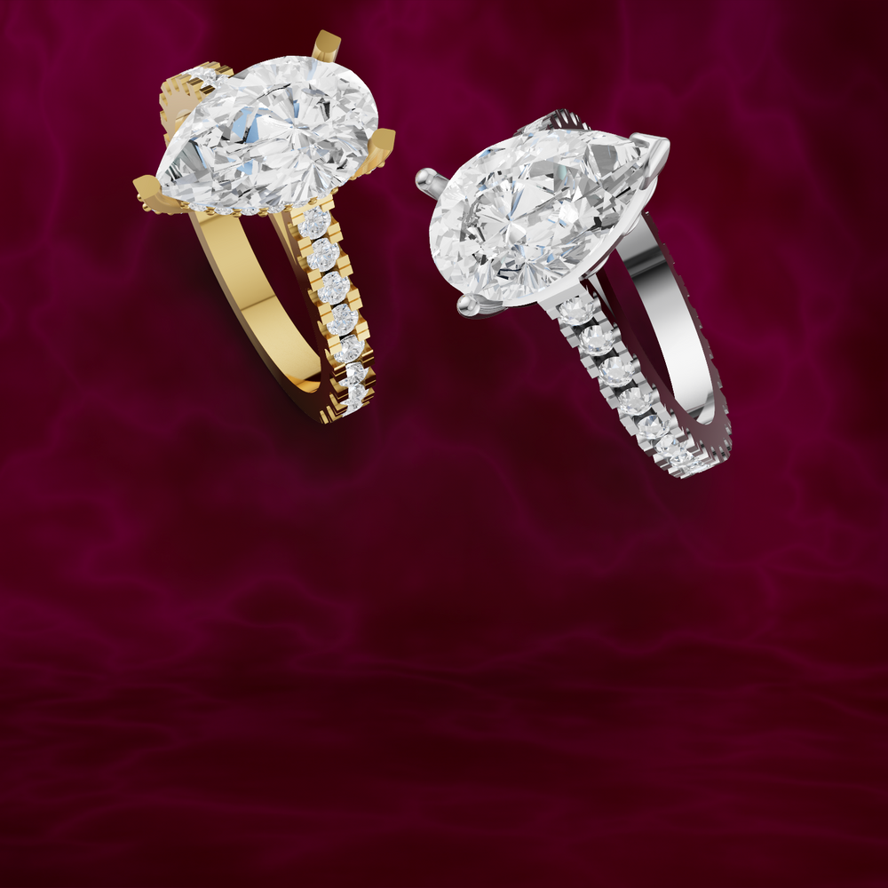 gold and white gold diamond rings on a red background