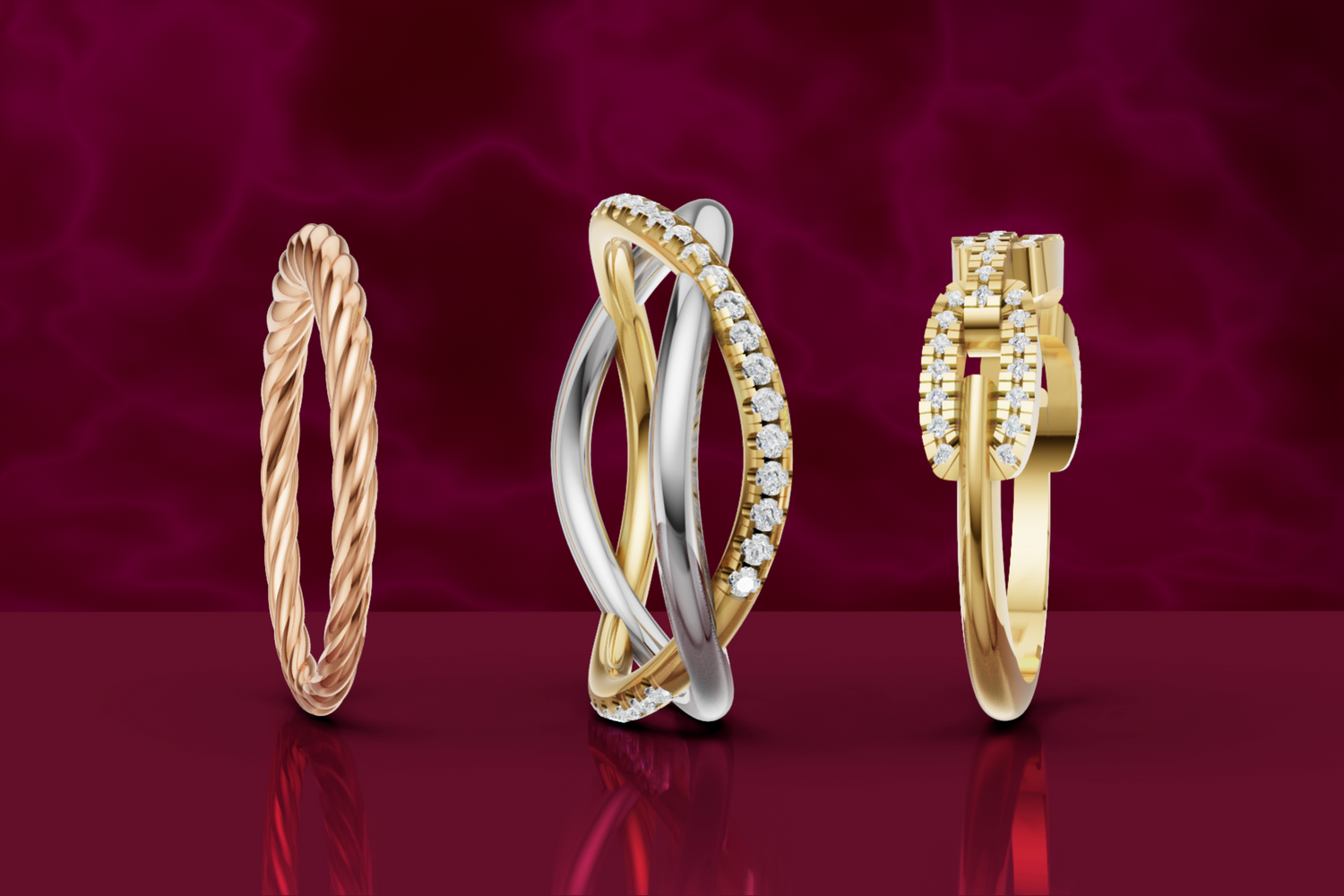 gold, white gold and rose gold rings on a red background