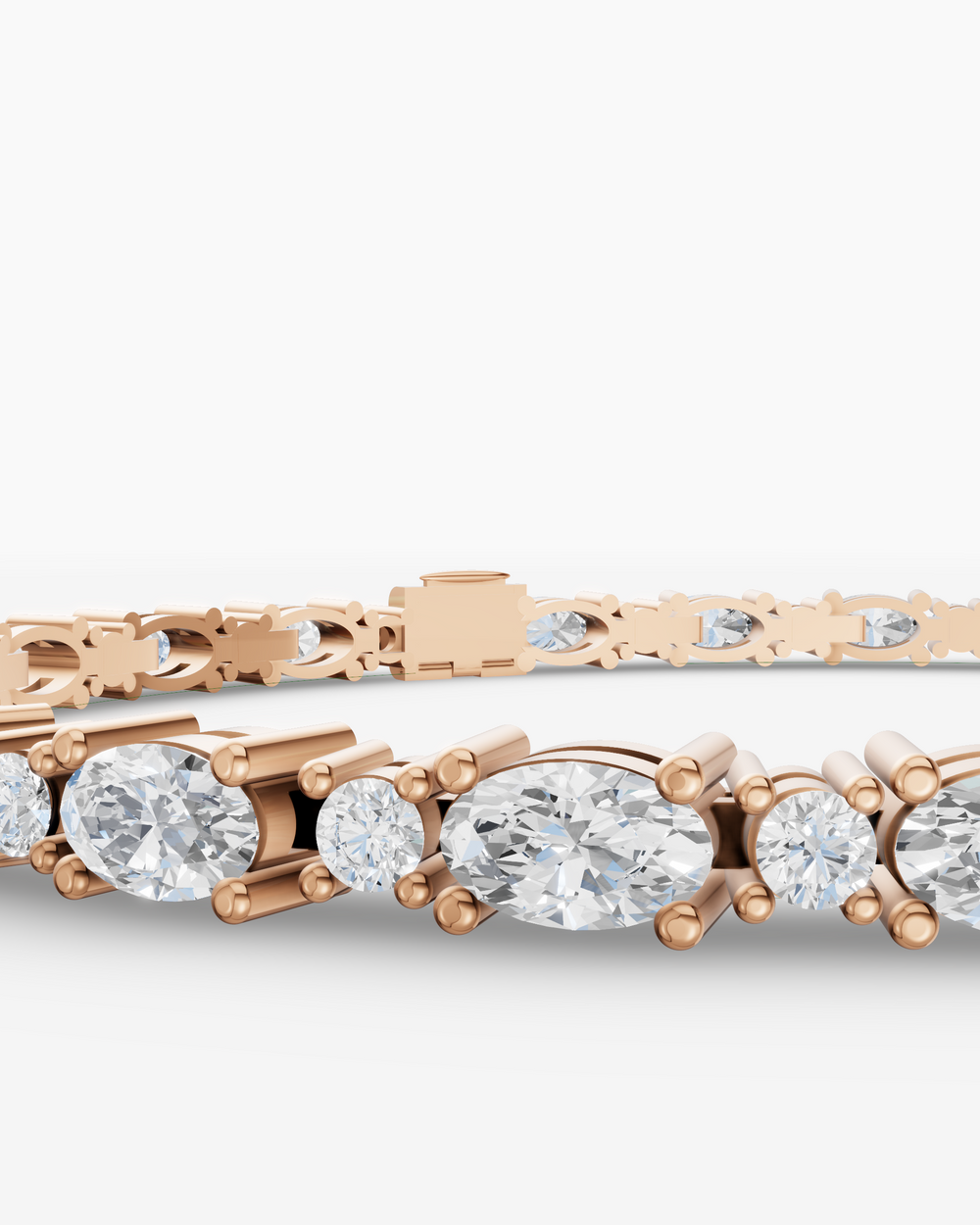 Rose gold bracelet with clear gemstones on a light gray background