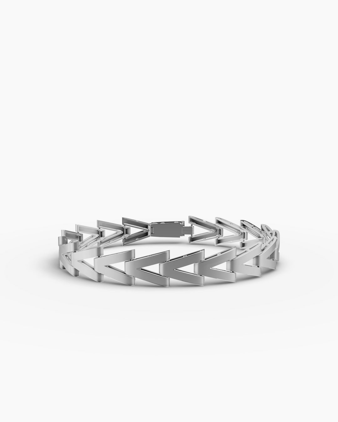 Silver bracelet with geometric design on a white background