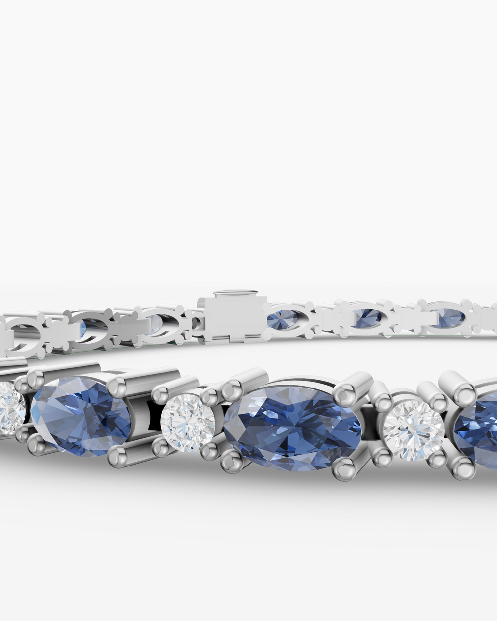 Silver bracelet with blue gemstones on a white background