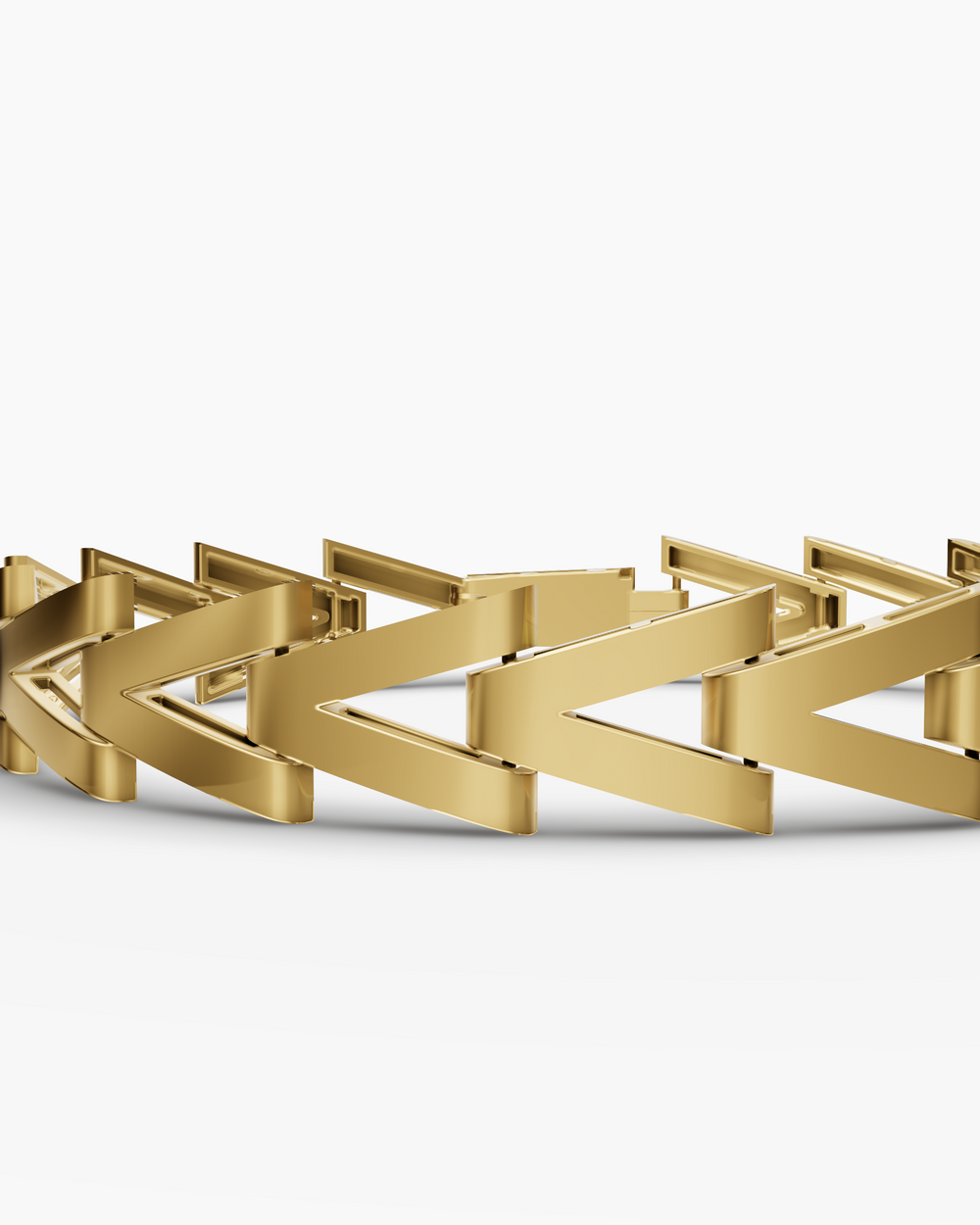 Gold bracelet with a geometric design on a white background