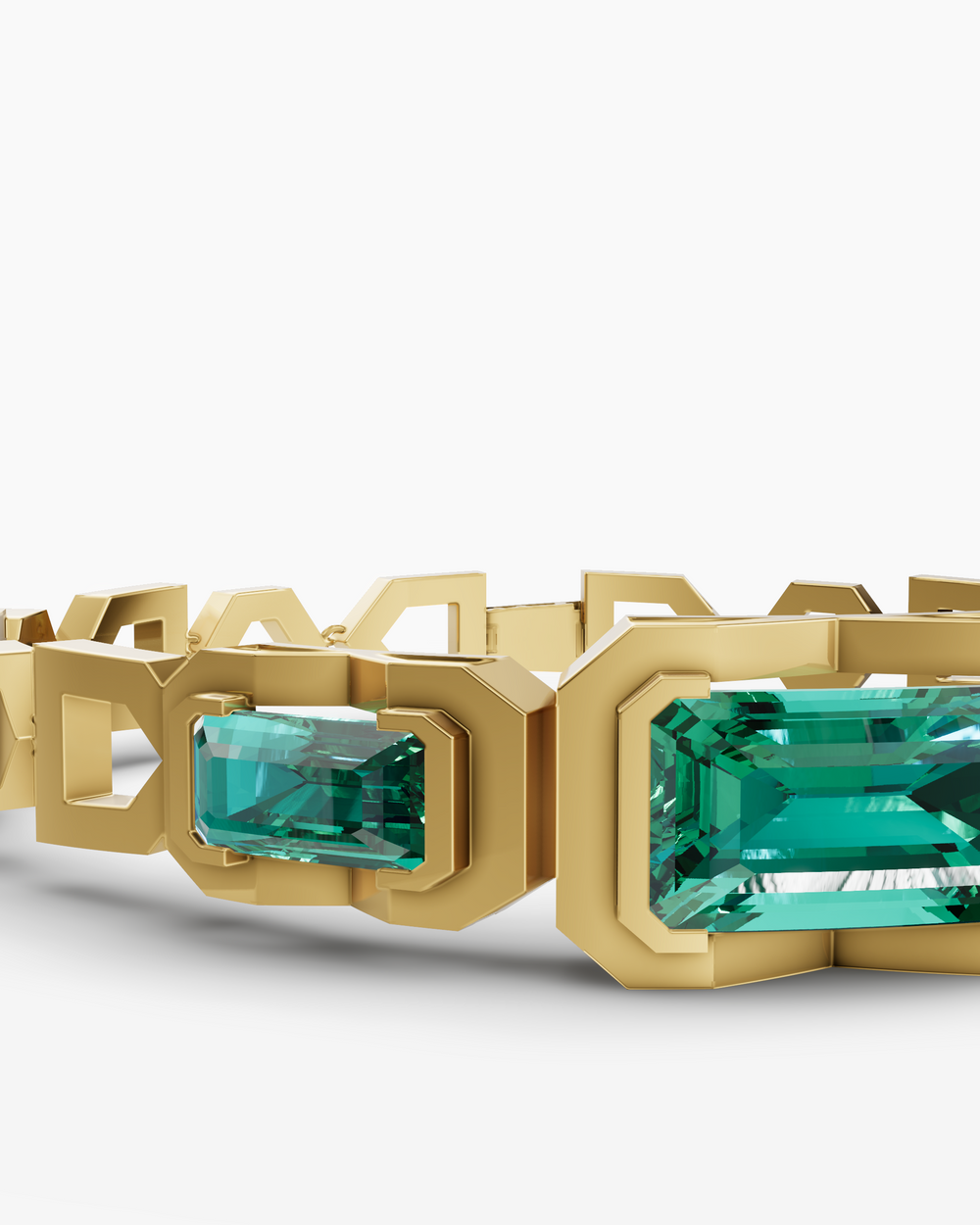 Gold bracelet with green gemstones on a white background
