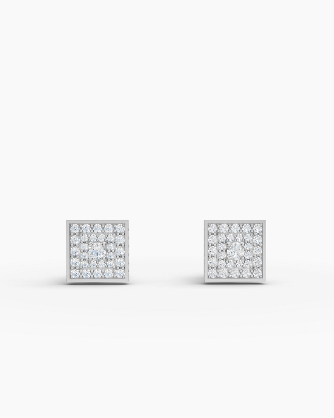 Pair of square diamond earrings on a light gray background