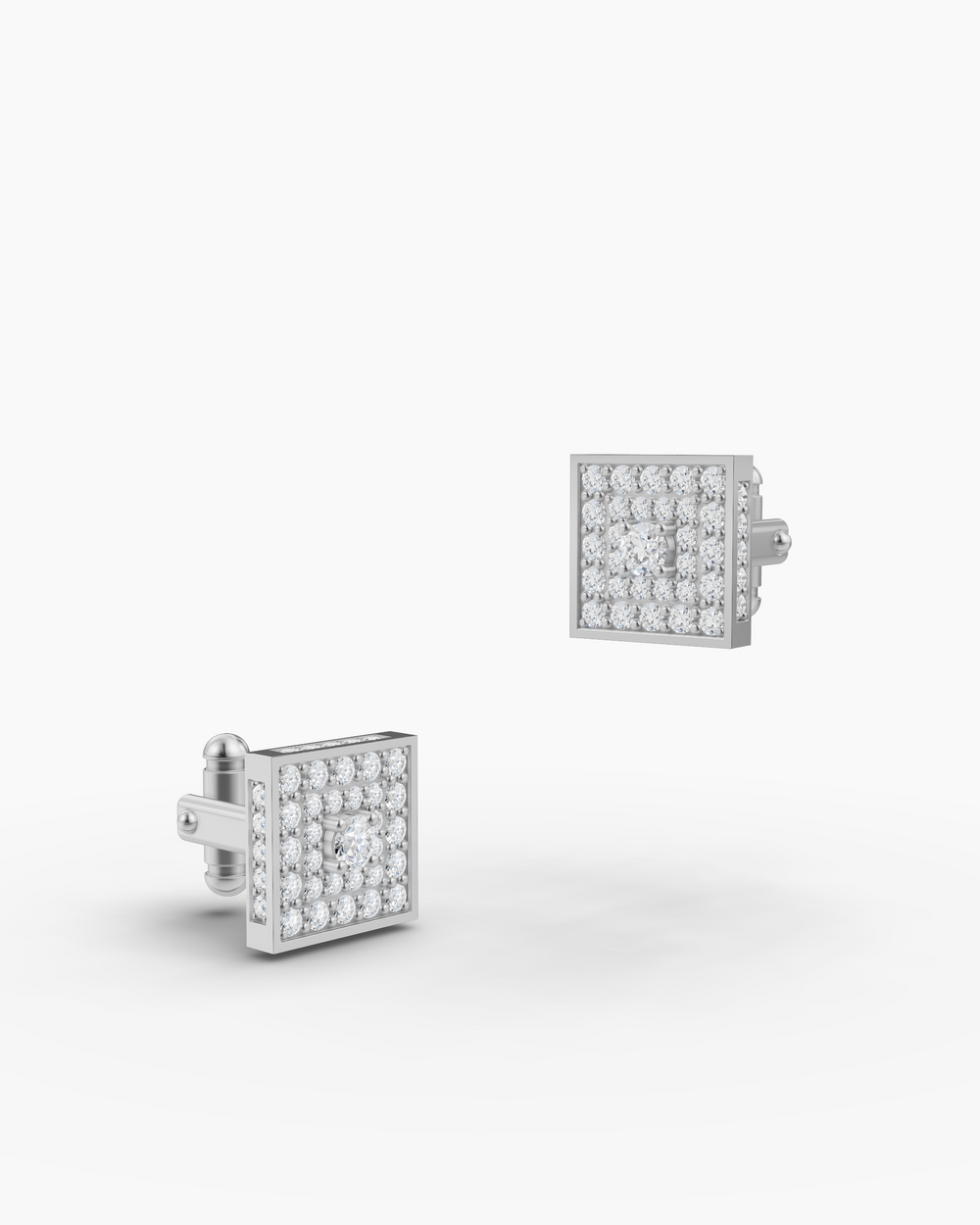 Pair of silver square cufflinks with clear stones on a white background