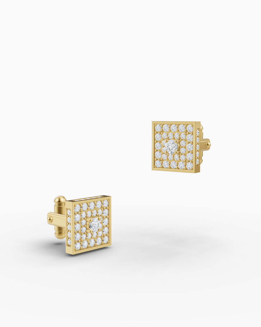 Gold square cufflinks with embedded stones on a white background